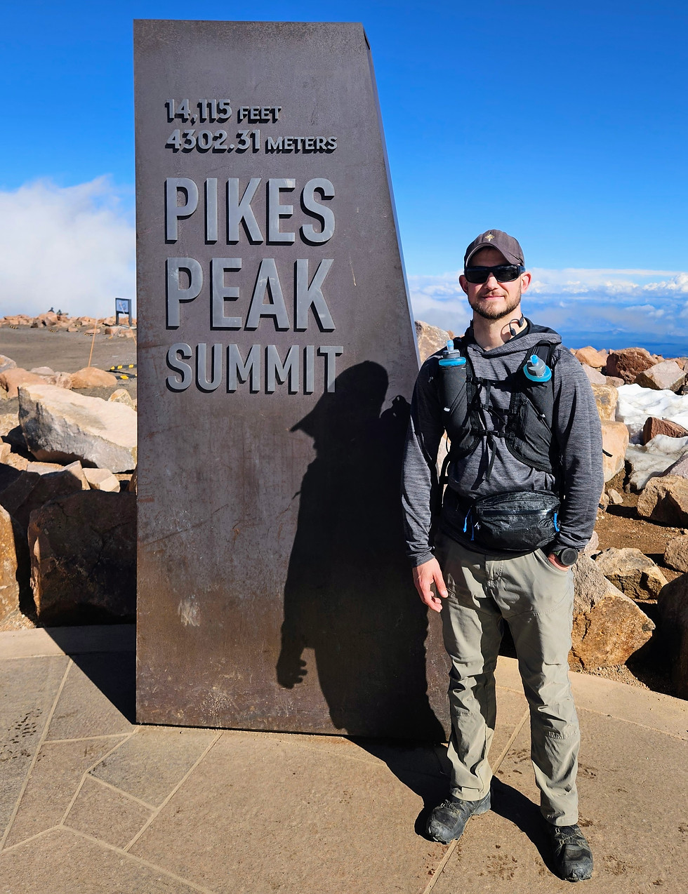 Endurance athlete, Jeff Snyder, at Pikes Peak summit.