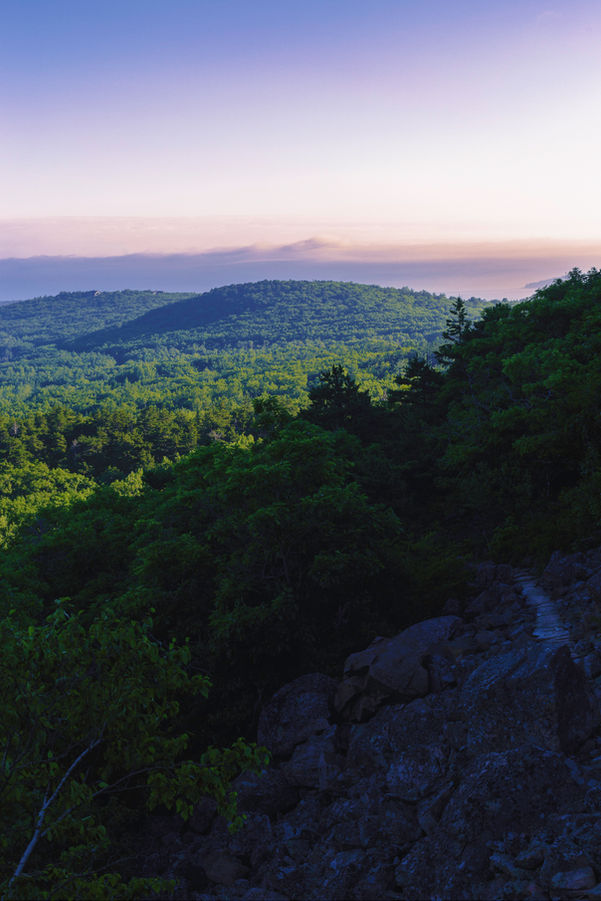 sunrise view of rolling hills.