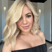 Bright blonde hair color with soft waves styled in a Brandon Florida salon.