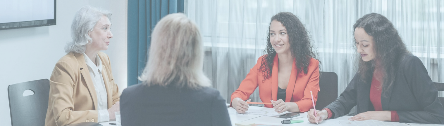 women attending a meeting