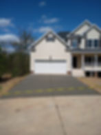 Newly paved driveway made with quality concrete