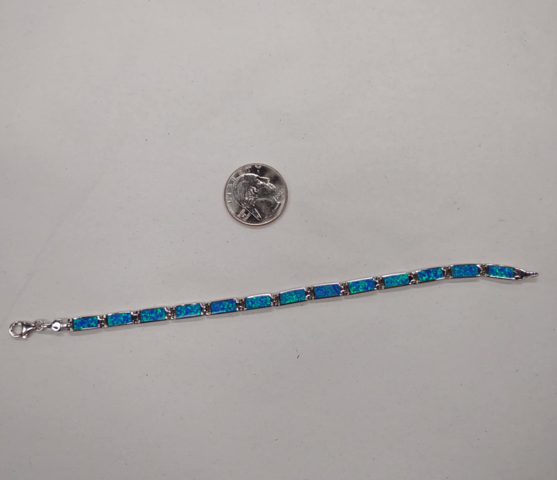 Sterling Silver and Dyed Opal Tennis Bracelet