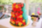 3 tier wedding cake in buttercream with flowers in buttercream