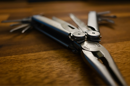 Multi-tool with various components open_