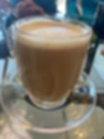 a cup of coffee on a table