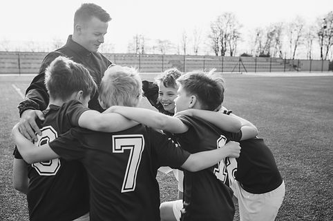 Coach talking with players