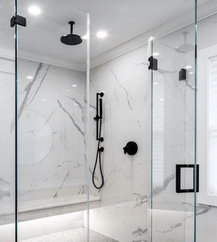 Modern shower with glass enclosure and percaline walls with rain shower head 