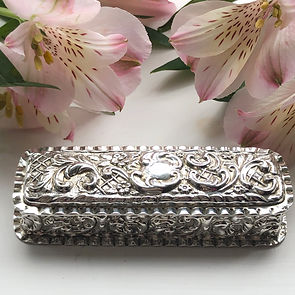 A Silver Box With Embossed Decoration Chester 1900.