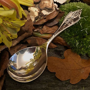 A Sterling Silver Gorge Jensen Tea Caddy Spoon.