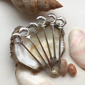 A Set Of Six Sterling Silver two-pronged Cocktail or Buffet Forks