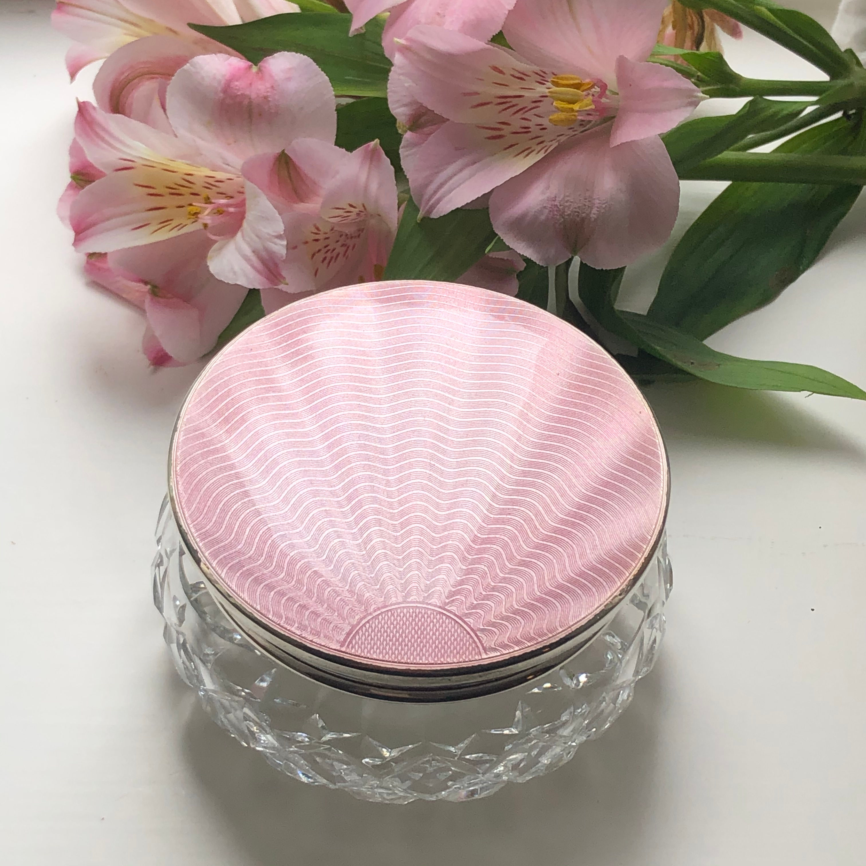 A Pink Enamel Dressing Table Jar With A Art Deco Sun Burst Design Birm 1956.