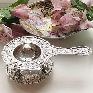 A Antique German Silver Tea Strainer On Its Original Stand Circa 1900.