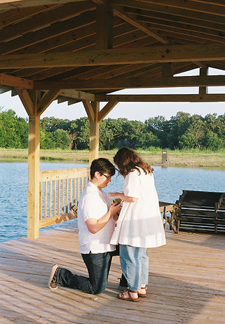 engagement on a dock by a pond in Texas