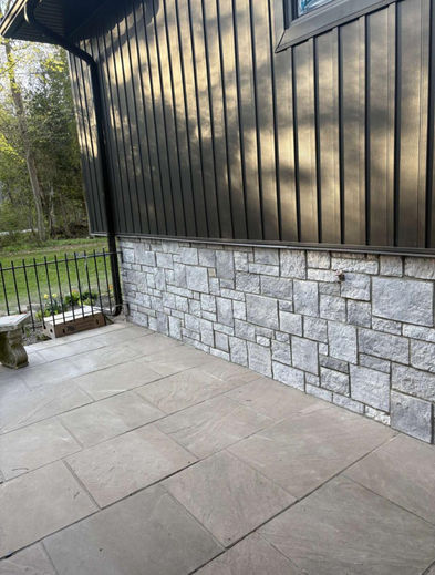 Exterior home facade installation featuring Cathedral Grey Ashlar manufactured stone by Canyon Stone in Milton, Ontario