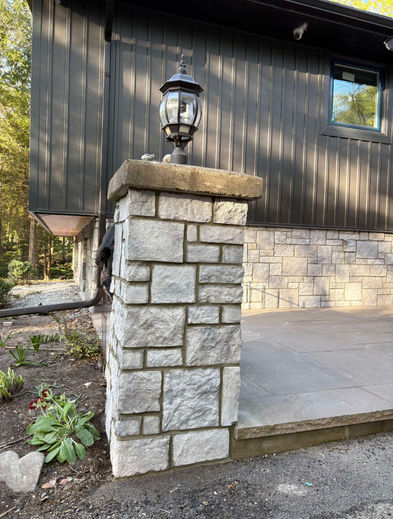Custom exterior stone column installation featuring Cathedral Grey Ashlar Stone manufactured stone by Canyon Stone in Milton, Ontario