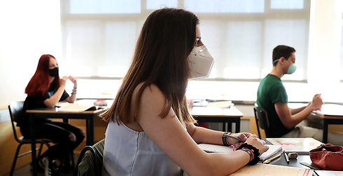 kids with masks in classroom.jpg
