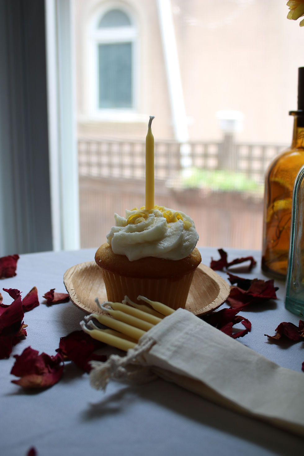 Thumbnail: Beeswax Birthday candle on a vanilla cupcake