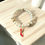 Thumbnail: DABC Pearl Boutique Charm Bracelets