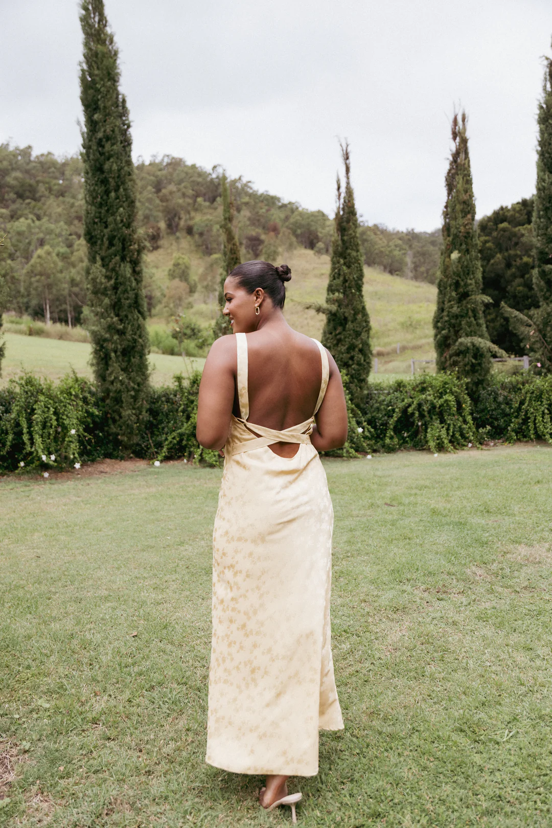 yellow floral pattern satin dress with open back