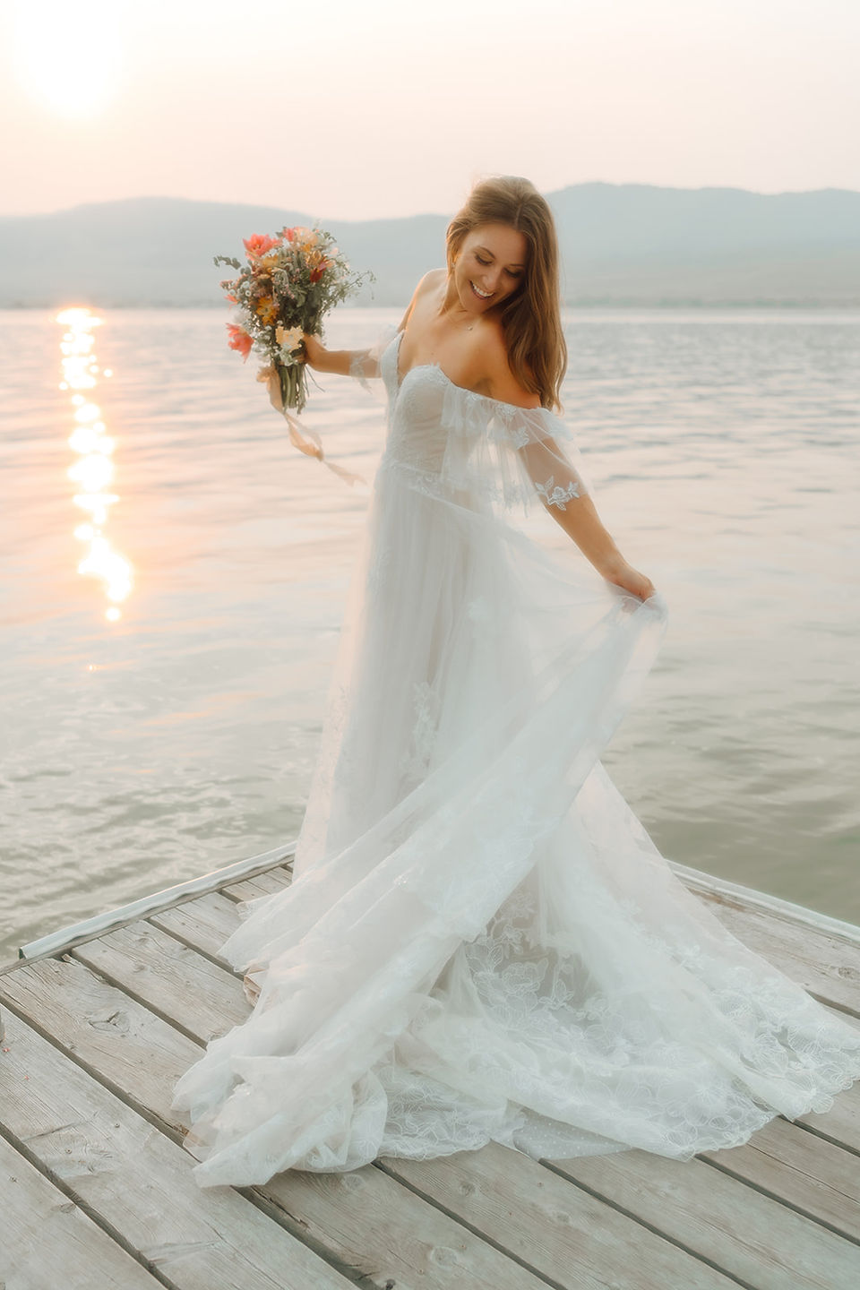 bride with bouquet on dock