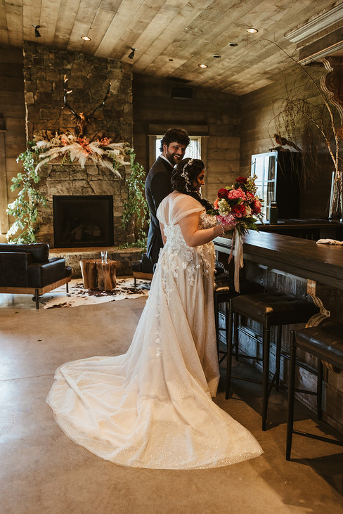 bride with bridal bouquet at bar
