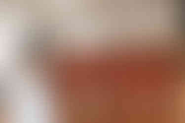 bride first look with bridesmaids in satin dresses