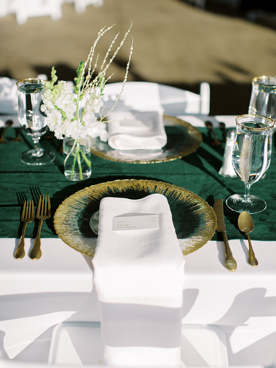 gold and emerald table setting details