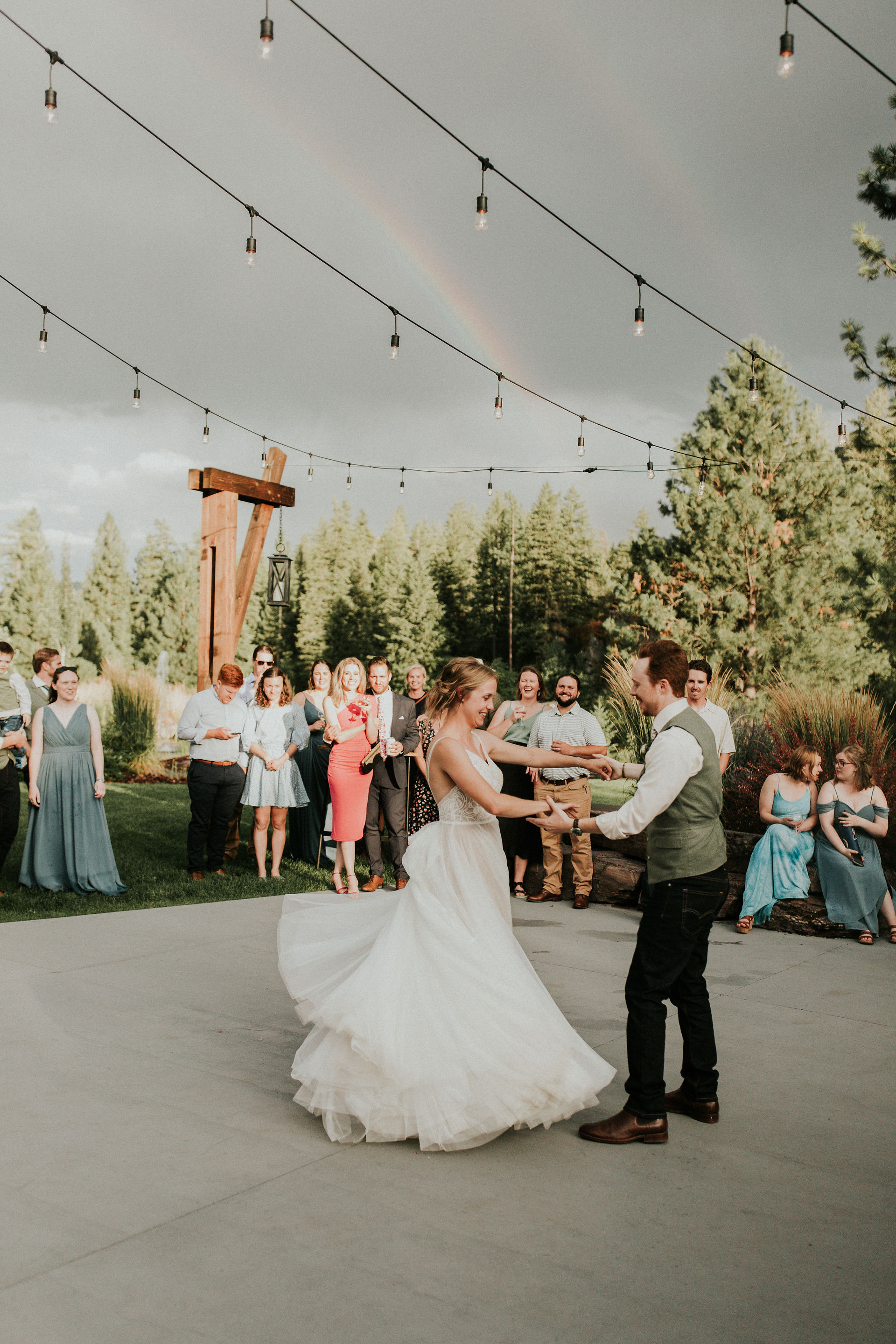 bride and groom first dance on patio