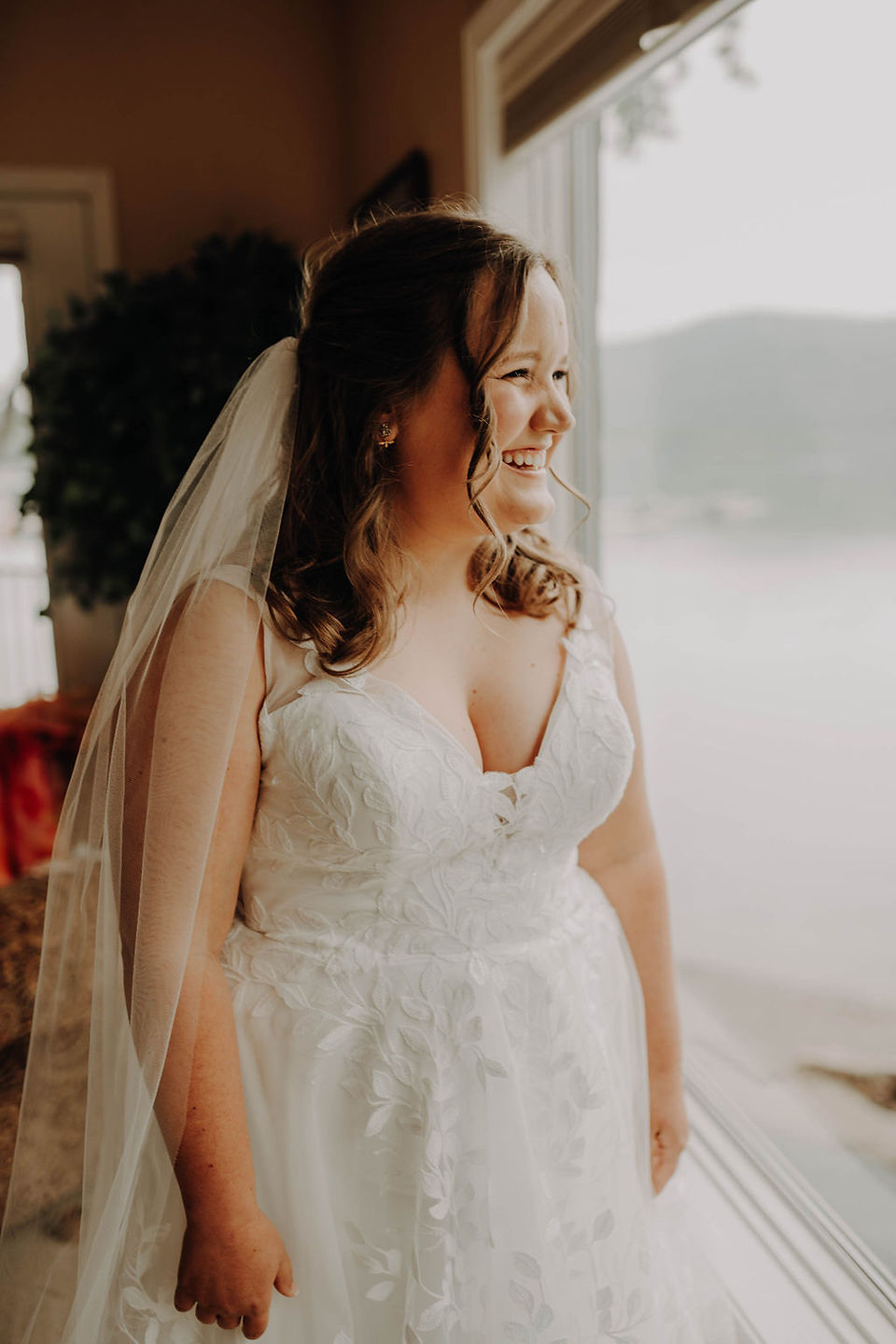 bride in wedding dress with veil 