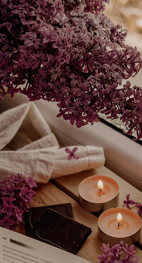 white candle beside white book_edited.jp