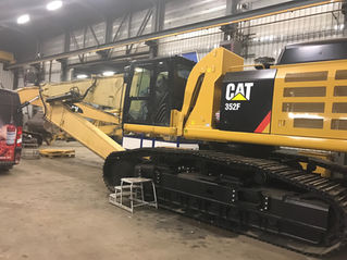 Lincoln vetsmering op CAT 352F