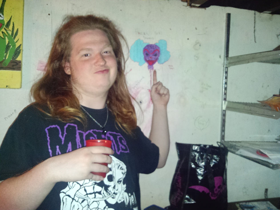 T and his art on A's wall