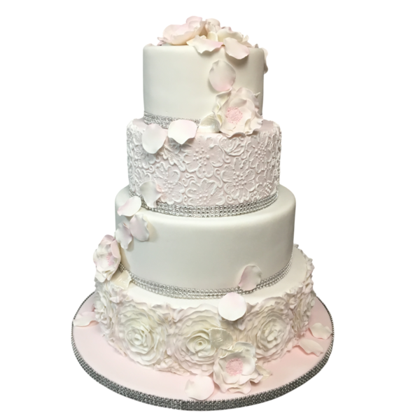 Four-tier wedding cake with floral motifs, lace patterns, and pastel petals.