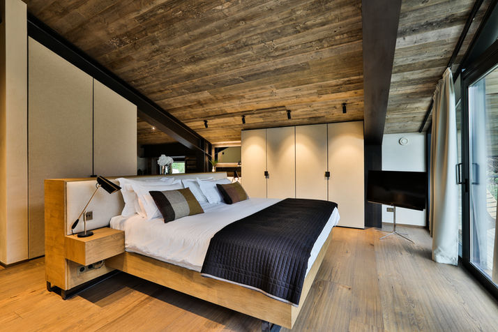 Master bedroom with luxury king size bed and direct view on the Mont Blanc at Chalet on the Rocks, Chamonix