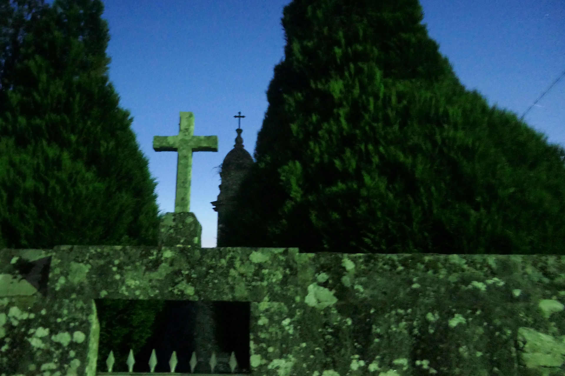 This was a wall outside of a church on the outskirts of Negreira before sunrise.
