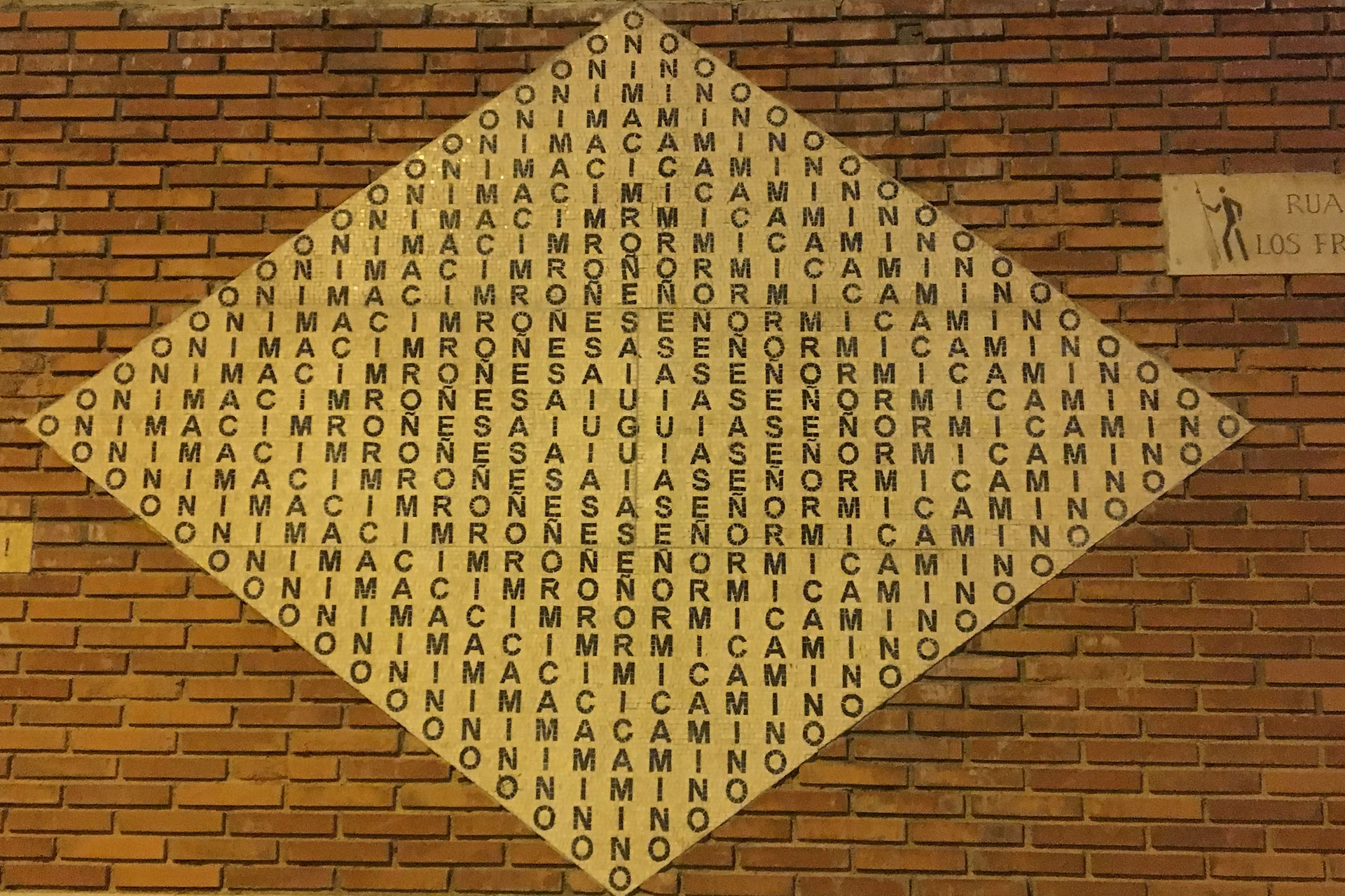 This is a mosaic on a church that I saw on my way out of Astorga. You will note "Camino" is spelled forwards and backwards.