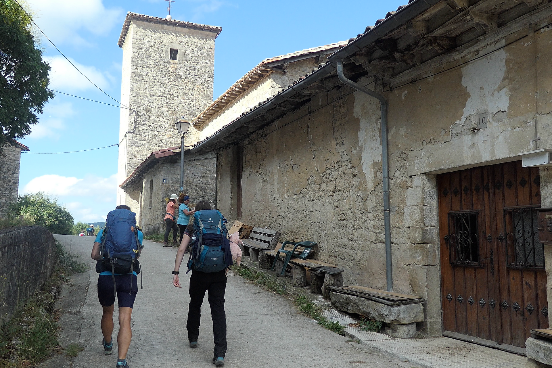 Astrid and Tanja walking through another village.