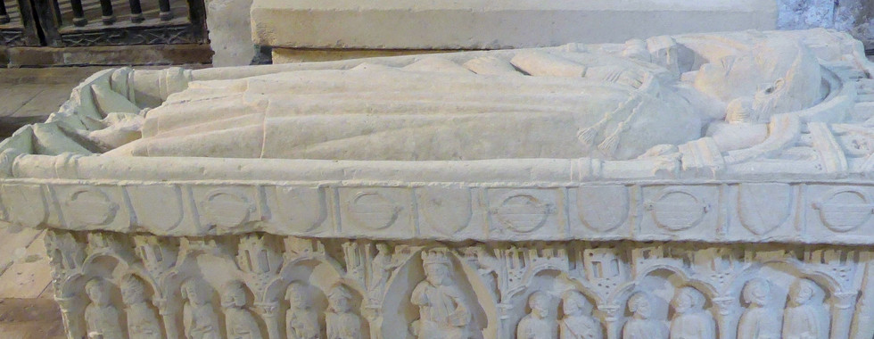 Here is an image of a tomb inside Real Monasterio San Zoilo.