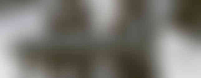 Here is a black and white photo of me at a pilgrim sculpture.