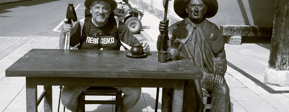 Here is a black and white photo of me at a pilgrim sculpture.