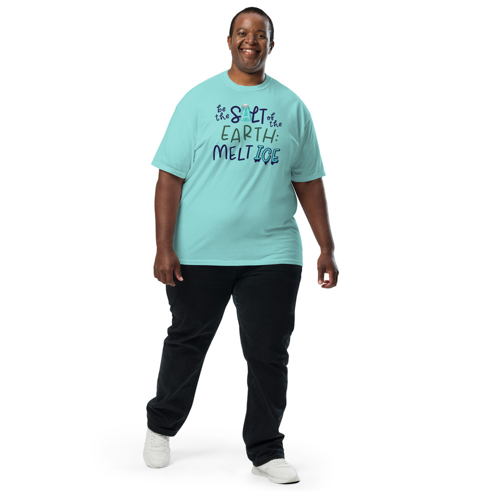 Plus size man walking wearing Comfort Colors Tee reading "Be the salt of the earth: melt ice" in color Lagoon Blue