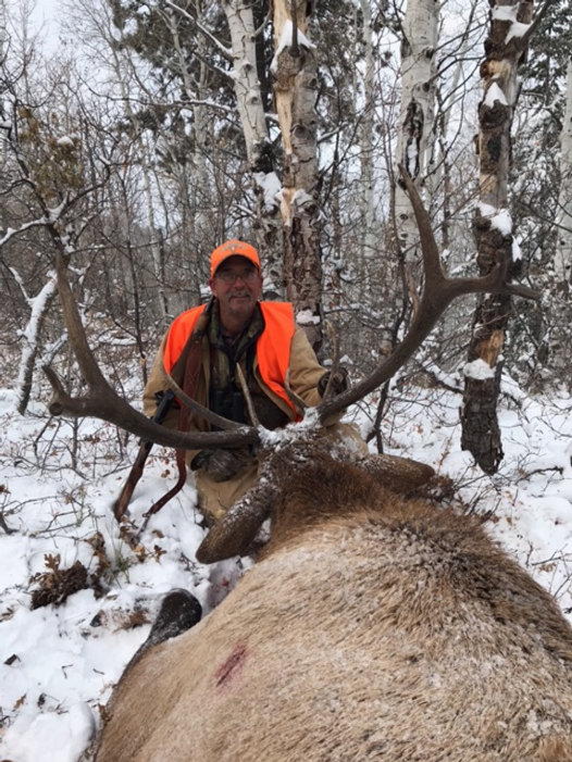 Man holding a deer