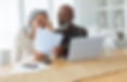 Black%20couple%20with%20laptop%20reviewi