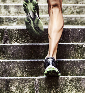Close-up of someone running up stairs