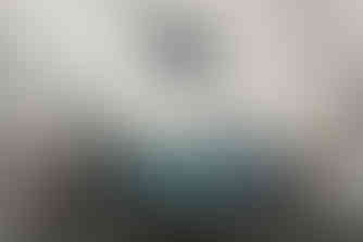 painting of winter sun and thawing snow hung on a wall