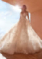 front view lace ball gown with a plunging sweetheart neckline and long fitted lace sleeves