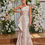 Thumbnail: Elegant pink one shoulder dress for mother of the bride in brocade fabric with ruffle peplum