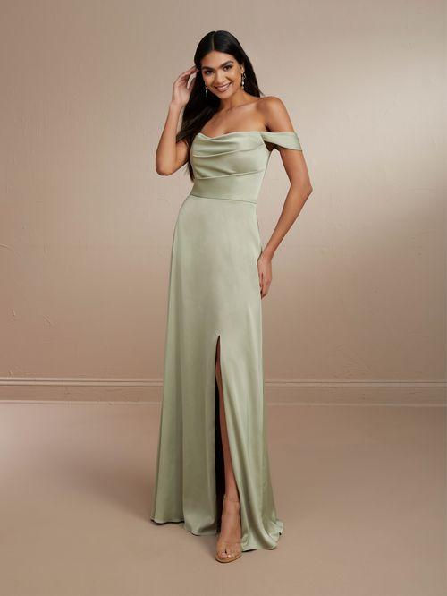 Thumbnail: sage slim a line charmeuse bridesmaids gown with a straight neckline and off the shoulder sleeves with a skirt slit