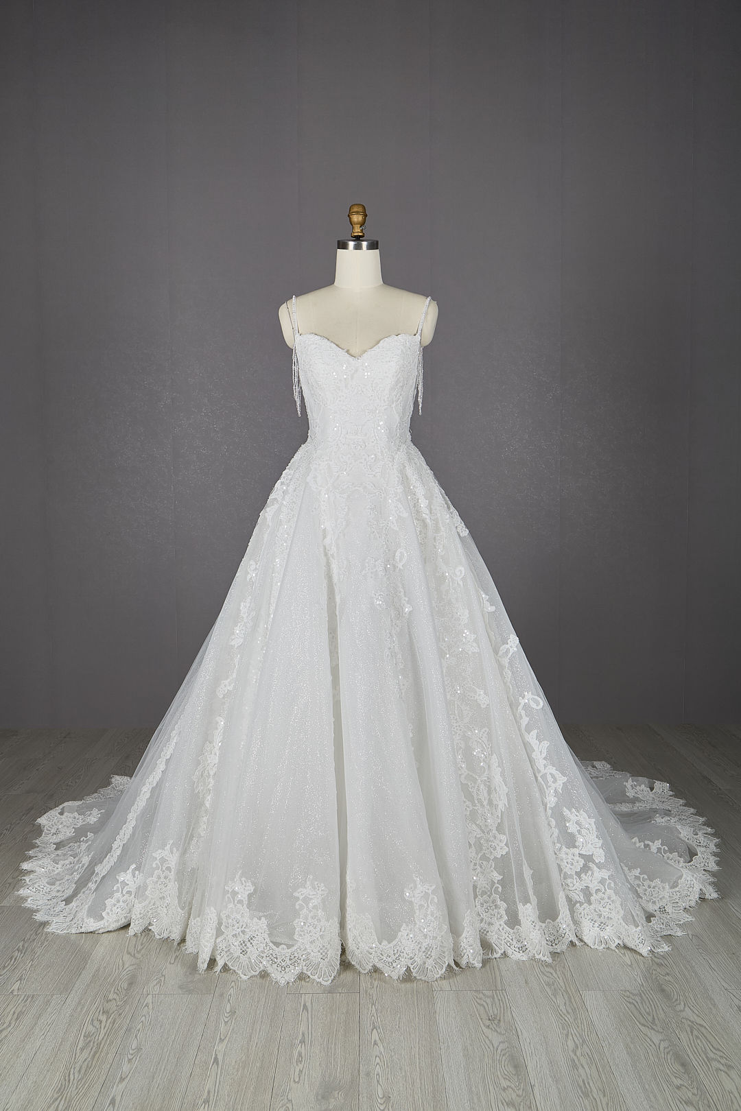 Sparkly tulle ballgown with chantilly lace through the bodice and skirt