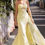 Thumbnail: yellow Strapless chiffon fitted dress with a sheer basque waist corset bodice featuring asymmetrical draping and a slit